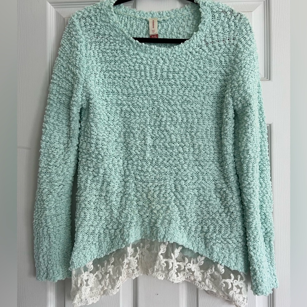 No Boundaries blue sweater. White lace on the bottom trim. Size XL.